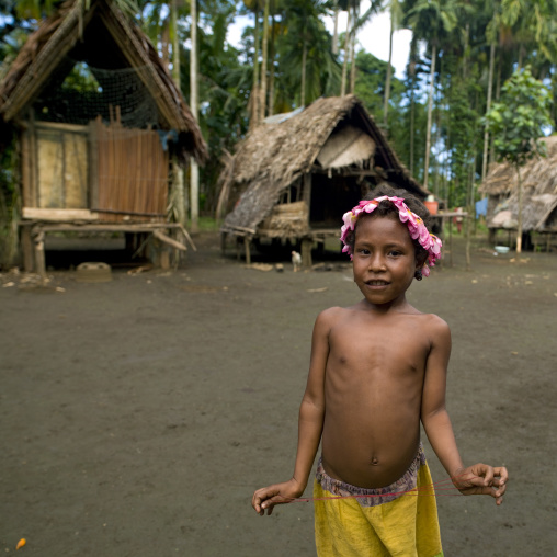 Gilr with flowers in the hair, Milne Bay Province, Trobriand Island, Papua New Guinea