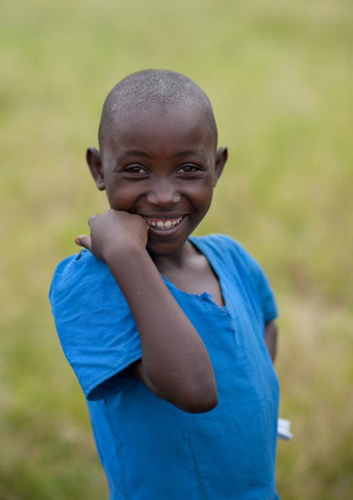 Smiling rwandan pupil outside of a school, Lake Kivu, Gisenye, Rwanda