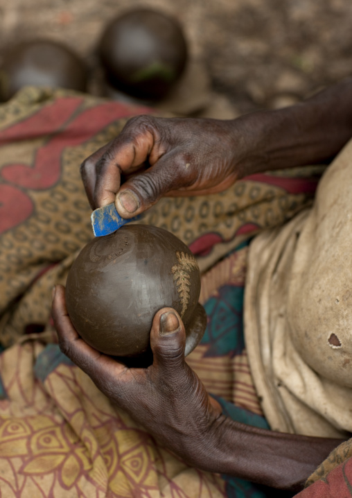 Batwa tribe woman making pottery, Western Province, Cyamudongo, Rwanda