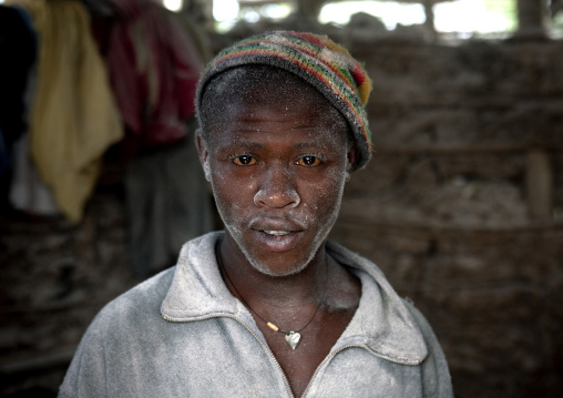 Rwandan man working in a mill, Kigali Province, Kigali, Rwanda