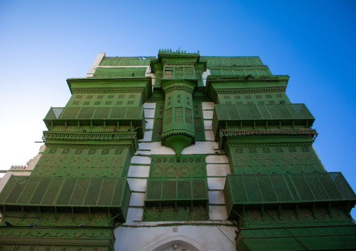 Old house with green wooden mashrabiya in al-Balad quarter, Mecca province, Jeddah, Saudi Arabia