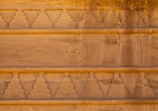 Nabataean tomb rosette in al-Hijr archaeological site in Madain Saleh, Al Madinah Province, Alula, Saudi Arabia