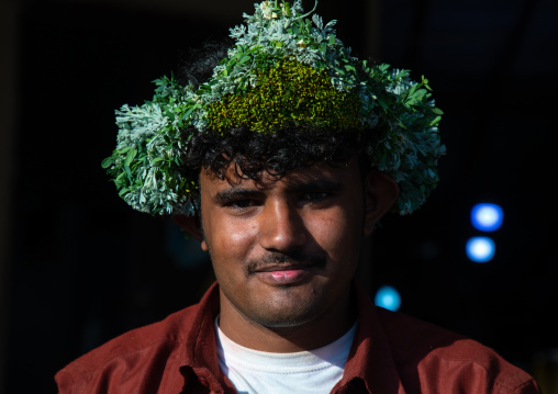 Portrait of a flower man wearing a floral crown on the head, Jizan province, Sabya, Saudi Arabia