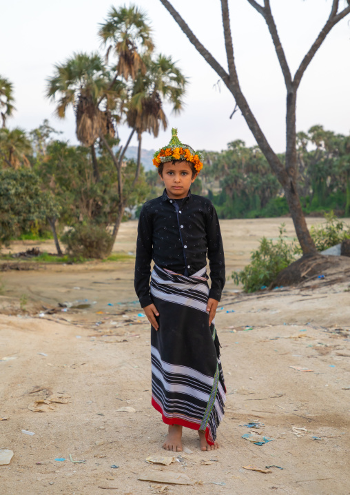 Portrait of a flower boy wearing a floral crown on the head, Jizan province, Alaydabi, Saudi Arabia