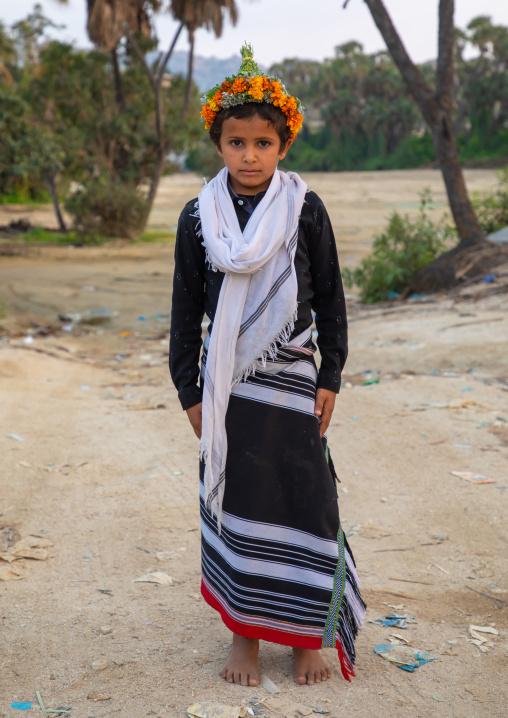 Portrait of a flower boy wearing a floral crown on the head, Jizan province, Alaydabi, Saudi Arabia