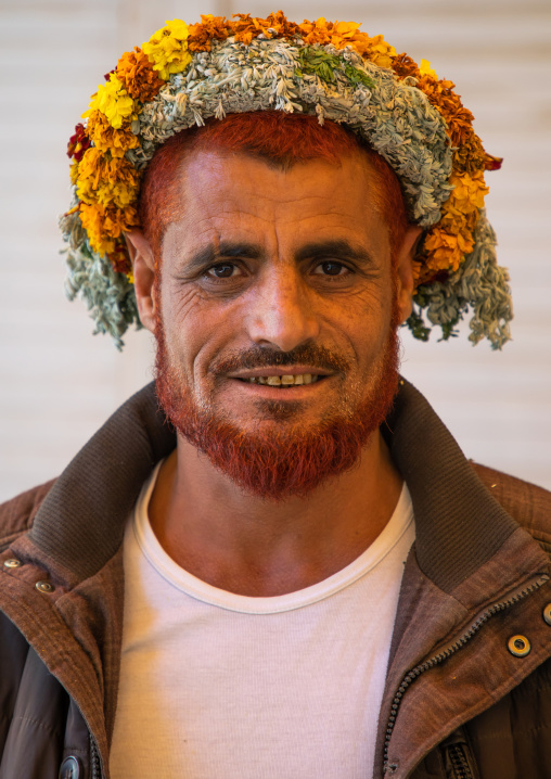 Portrait of a flower man wearing a floral crown on the head, Jizan province, Addayer, Saudi Arabia