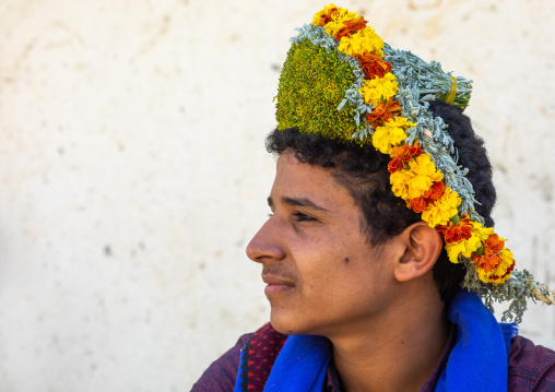 Portrait of a flower man wearing a floral crown on the head, Jizan province, Addayer, Saudi Arabia