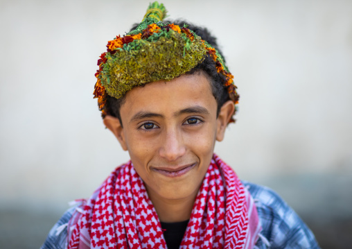 Portrait of a flower man wearing a floral crown on the head, Jizan province, Addayer, Saudi Arabia