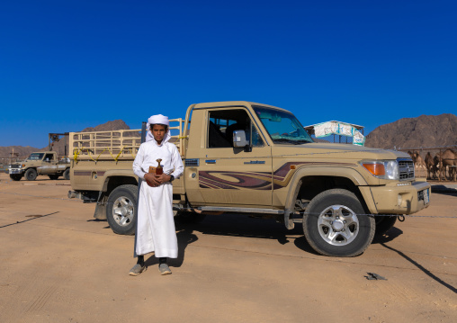 Portrait of a saudi boy wearing a white tradtional clothing, Najran Province, Najran, Saudi Arabia
