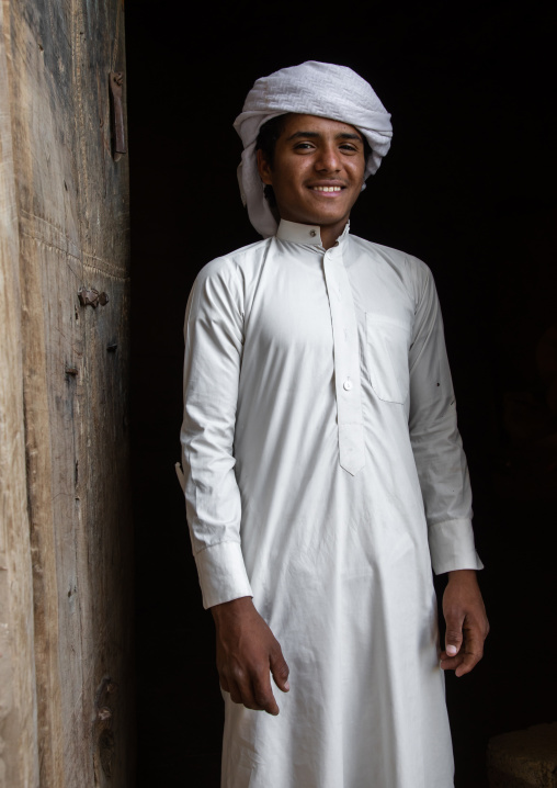 Portrait of a saudi man at the entrance of his house, Najran Province, Najran, Saudi Arabia