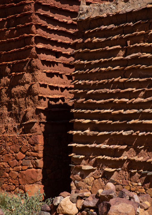 Red stone and mud houses with slates in a village, Asir province, Sarat Abidah, Saudi Arabia