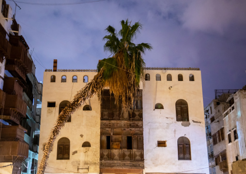 Historic house with wooden mashrabiyas in al-Balad quarter at night, Mecca province, Jeddah, Saudi Arabia