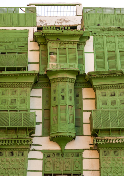 Old house with green wooden mashrabiya in al-Balad quarter, Mecca province, Jeddah, Saudi Arabia