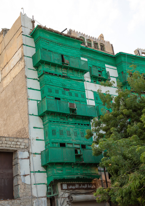 Old house with green wooden mashrabiya in al-Balad quarter, Mecca province, Jeddah, Saudi Arabia