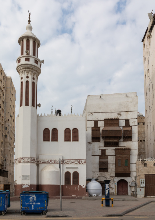 Old house with wooden mashrabiya in al-Balad quarter near a mosque, Mecca province, Jeddah, Saudi Arabia