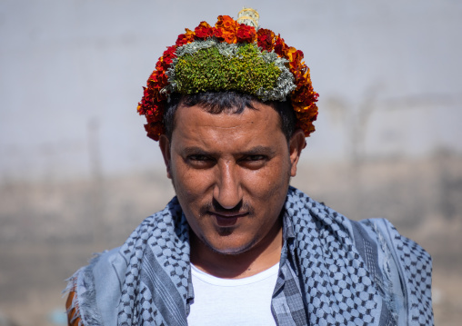 Portrait of a flower man wearing a floral crown on the head, Jizan Province, Addayer, Saudi Arabia
