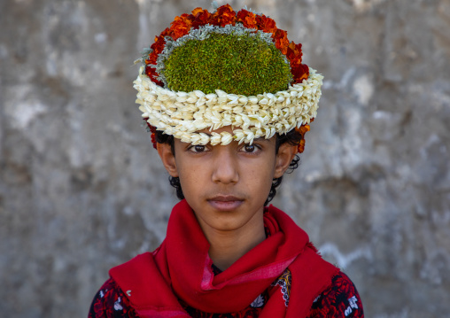 Portrait of a flower boy wearing a floral crown on the head, Jizan Province, Addayer, Saudi Arabia