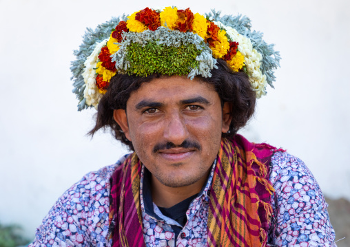 Portrait of a flower man wearing a floral crown on the head, Jizan Province, Addayer, Saudi Arabia