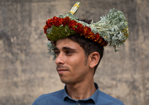 Portrait of a flower man wearing a floral crown on the head, Jizan Province, Addayer, Saudi Arabia
