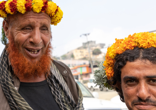 Portrait of flower men wearing floral crowns on the heads, Jizan Province, Addayer, Saudi Arabia