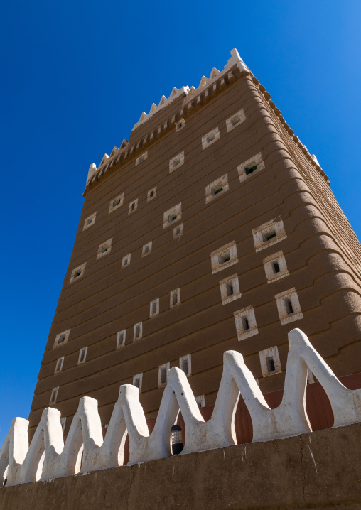 Traditional old mud house against blue sky, Najran Province, Najran, Saudi Arabia