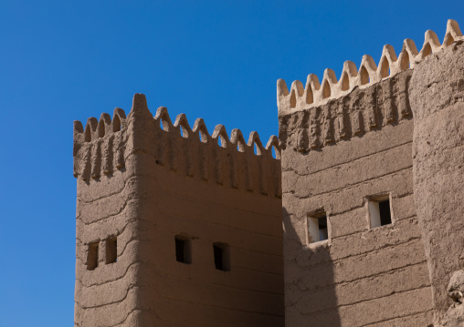 Traditional old mud house against blue sky, Najran Province, Najran, Saudi Arabia