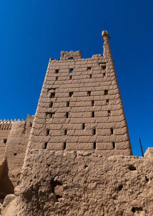 Traditional old mud house against blue sky, Najran Province, Najran, Saudi Arabia