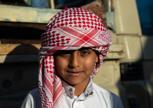 Saudi boy in the camel market, Najran Province, Najran, Saudi Arabia