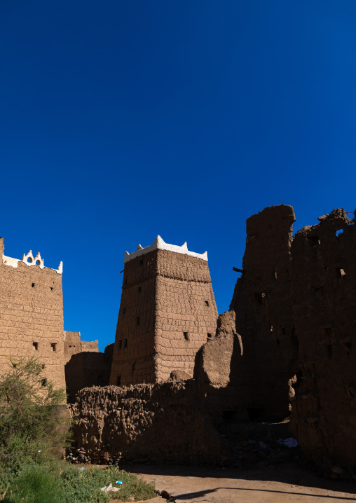 Old village of traditional mud houses against blue sky, Asir province, Dhahran Al Janub, Saudi Arabia