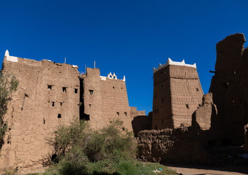 Old village of traditional mud houses against blue sky, Asir province, Dhahran Al Janub, Saudi Arabia