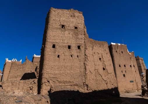 Old village of traditional mud houses against blue sky, Asir province, Dhahran Al Janub, Saudi Arabia