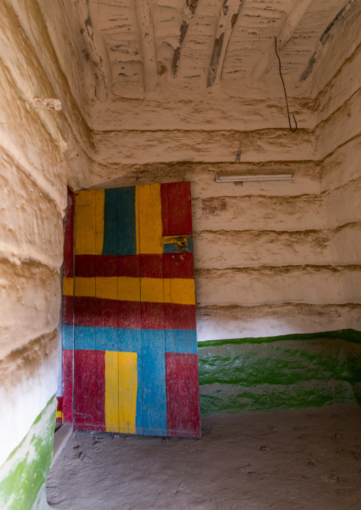 Colorful wooden door of an abandonned asiri house, Asir province, Sarat Abidah, Saudi Arabia