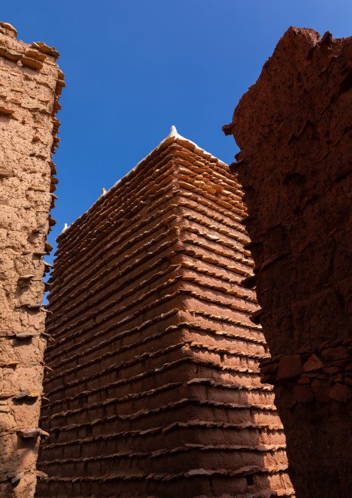 Red stone and mud houses with slates in a village, Asir province, Sarat Abidah, Saudi Arabia