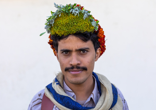 Portrait of a flower man wearing a floral crown on the head, Jizan Province, Addayer, Saudi Arabia