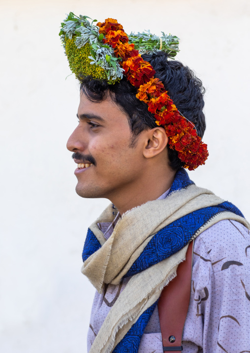 Portrait of a flower man wearing a floral crown on the head, Jizan Province, Addayer, Saudi Arabia