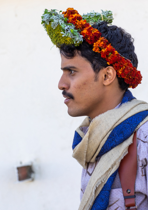 Portrait of a flower man wearing a floral crown on the head, Jizan Province, Addayer, Saudi Arabia