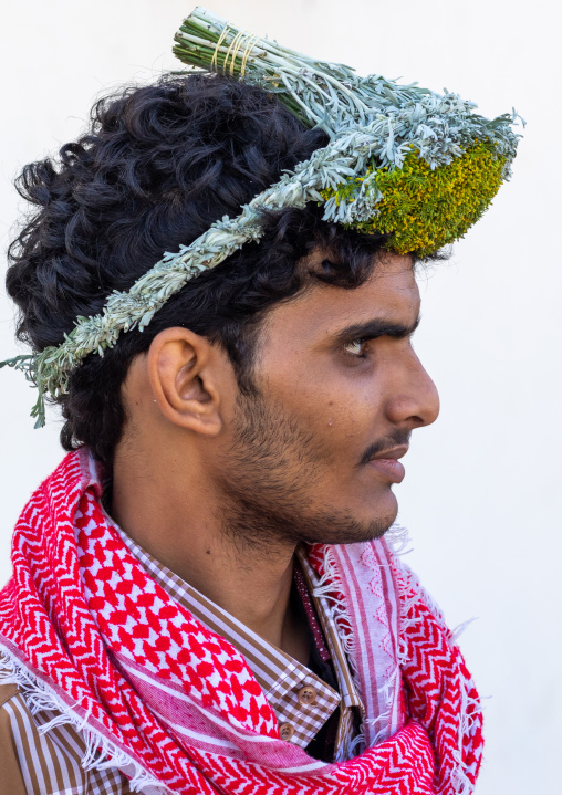Portrait of a flower man wearing a floral crown on the head, Jizan Province, Addayer, Saudi Arabia
