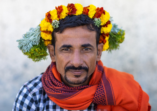 Portrait of a flower man wearing a floral crown on the head, Jizan Province, Addayer, Saudi Arabia