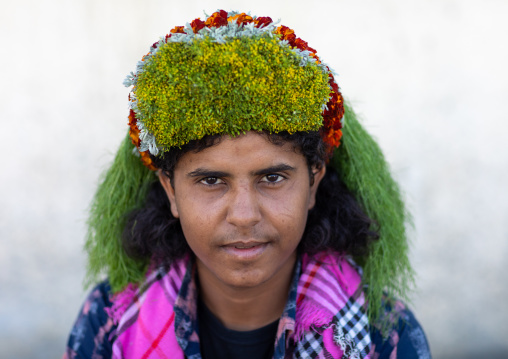 Portrait of a flower man wearing a floral crown on the head, Jizan Province, Addayer, Saudi Arabia