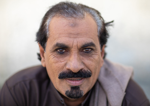 Portrait of a saudi man with kohl on his eyes, Jizan Province, Addayer, Saudi Arabia
