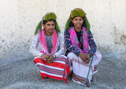 Portrait of flower men wearing floral crowns on the heads, Jizan Province, Addayer, Saudi Arabia