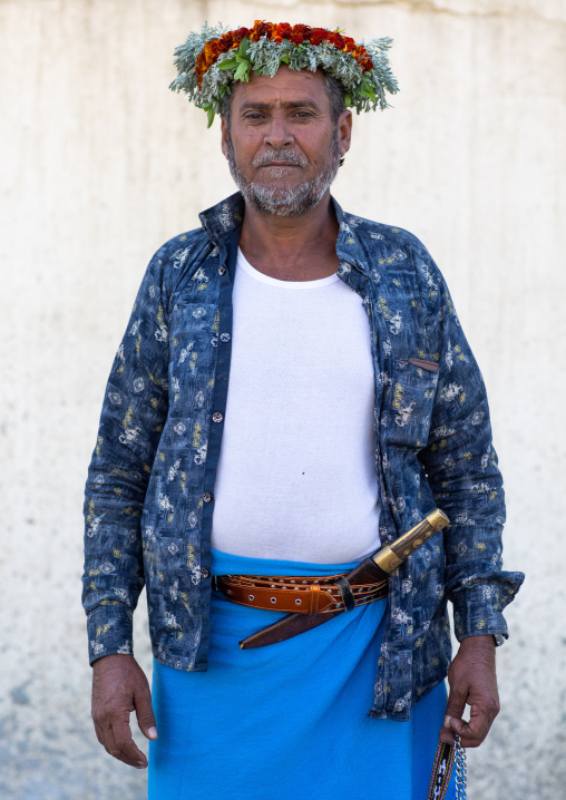 Portrait of a flower man wearing a floral crown on the head, Jizan Province, Addayer, Saudi Arabia