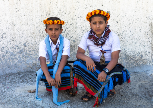 Portrait of flower boys wearing floral crowns on the heads, Jizan Province, Addayer, Saudi Arabia