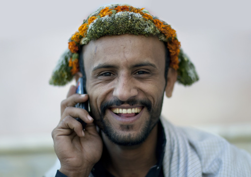 Portrait of a flower man wearing a floral crown on the head, Jizan province, Addayer, Saudi Arabia