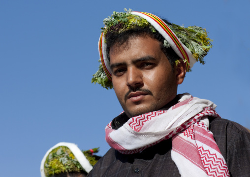 Portrait of a flower man wearing a floral crown on the head, Jizan province, Addayer, Saudi Arabia