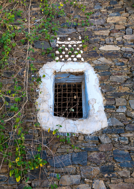Window in rijal alma traditional village with typical aseeri architecture, Rijal Almaa Province, Rijal Alma, Saudi Arabia