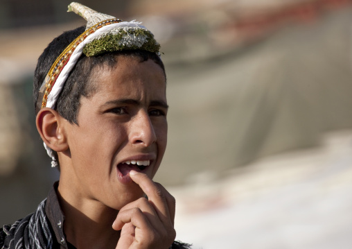 Portrait of a flower man wearing a floral crown on the head, Jizan province, Addayer, Saudi Arabia