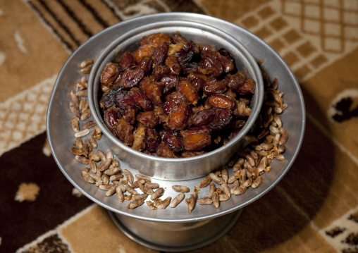 Dattes in a silver cup, Al-Jawf Province, Sakaka, Saudi Arabia