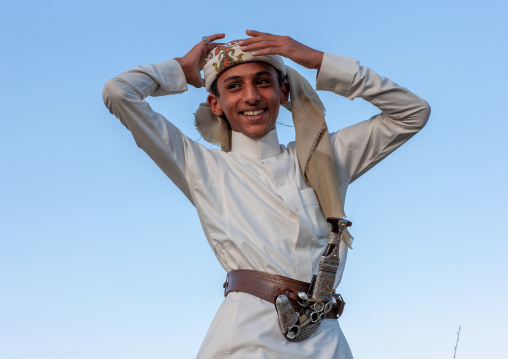 Young saudi man in traditional clothing wearing a jambyia, Al-Sarawat, Fifa Mountains, Saudi Arabia