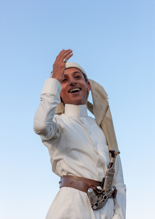 Young saudi man in traditional clothing wearing a jambyia, Al-Sarawat, Fifa Mountains, Saudi Arabia